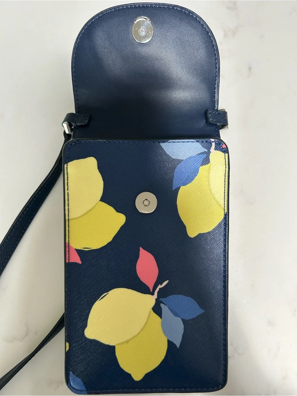 kate spade navy lemon print crossbody with pink and blue accents